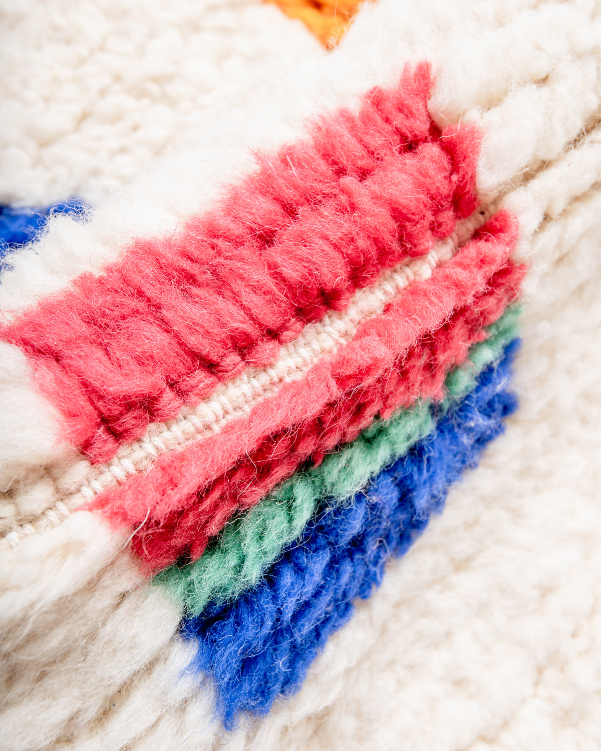 Modern, designer, handcrafted Berber rug from Morocco. Beniourain carpet with beautiful colours and patterns and fluffy wool texture.
